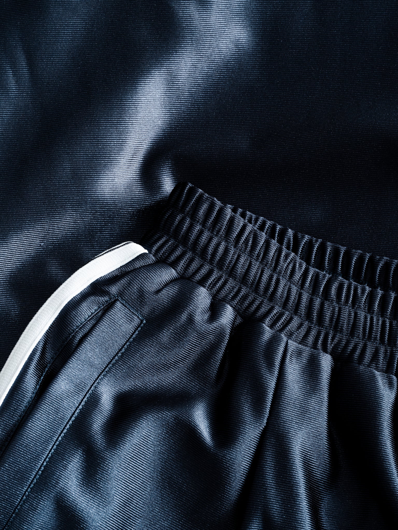 Navy League Shorts from Sweats UK laid flat, showing front view with elastic waistband and casual fit for men's activewear.