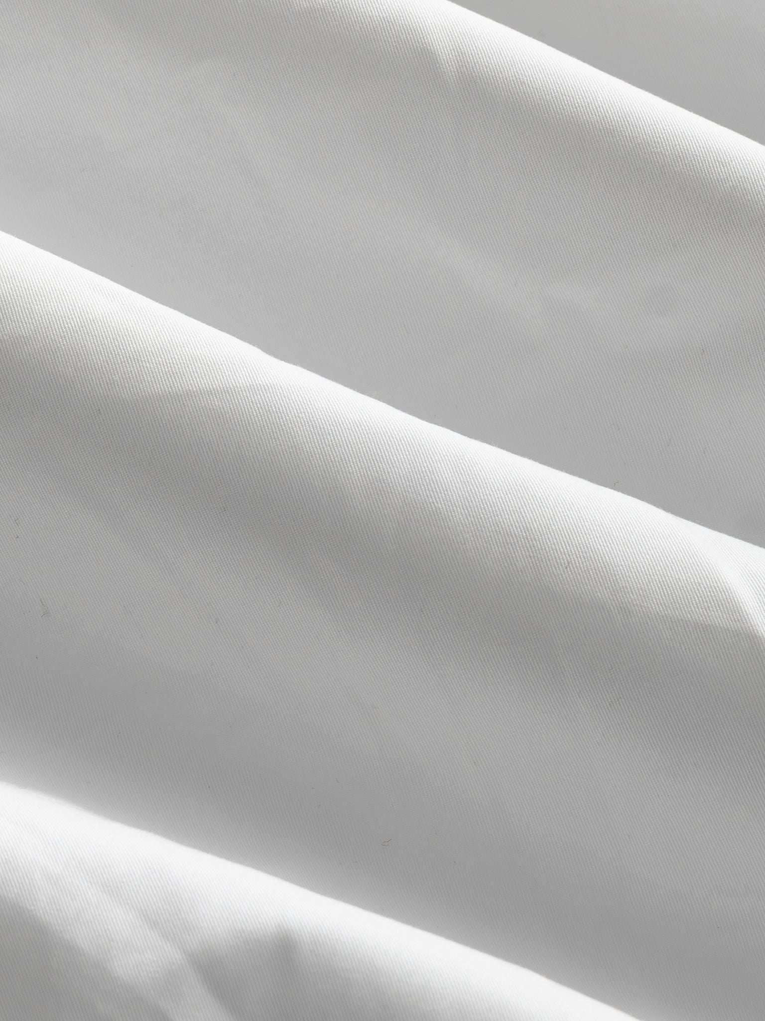 White V3 Flight Pant by Sweats UK displayed flat with waistband and pockets visible, showcasing casual athletic style.