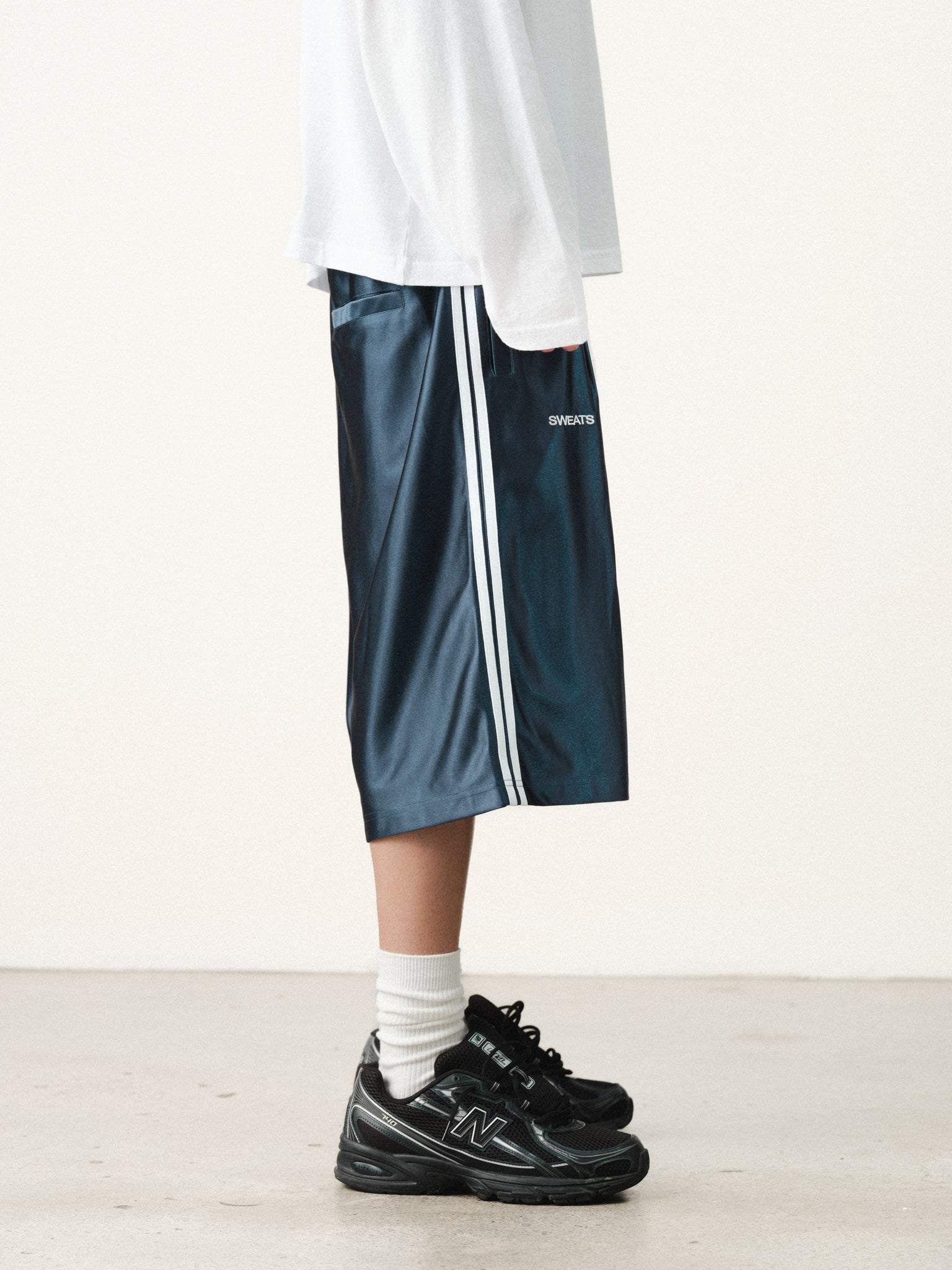 Navy League Shorts by Sweats UK, casual athletic shorts with elastic waistband and side pockets, perfect for summer wear.