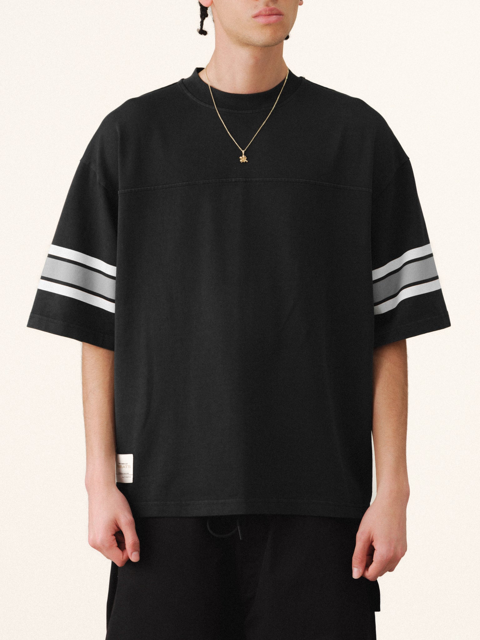 Washed black short-sleeve T-shirt from Sweats UK, casual cotton jersey with a relaxed fit on a neutral background.