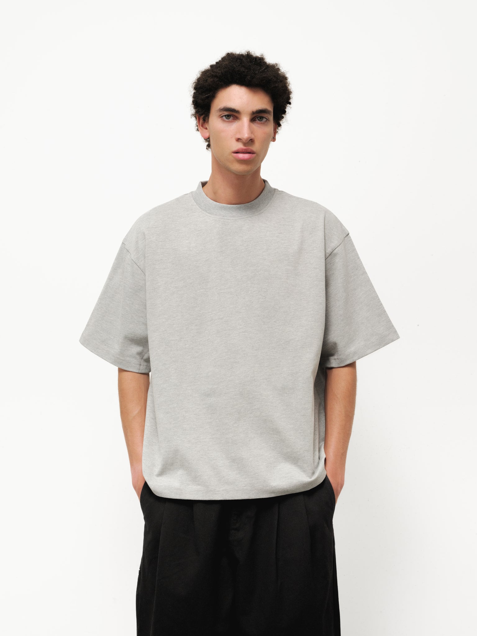 Marle grey Signature Blank T-shirt by Sweats UK displayed on a model, showcasing a classic, casual fit and soft fabric.
