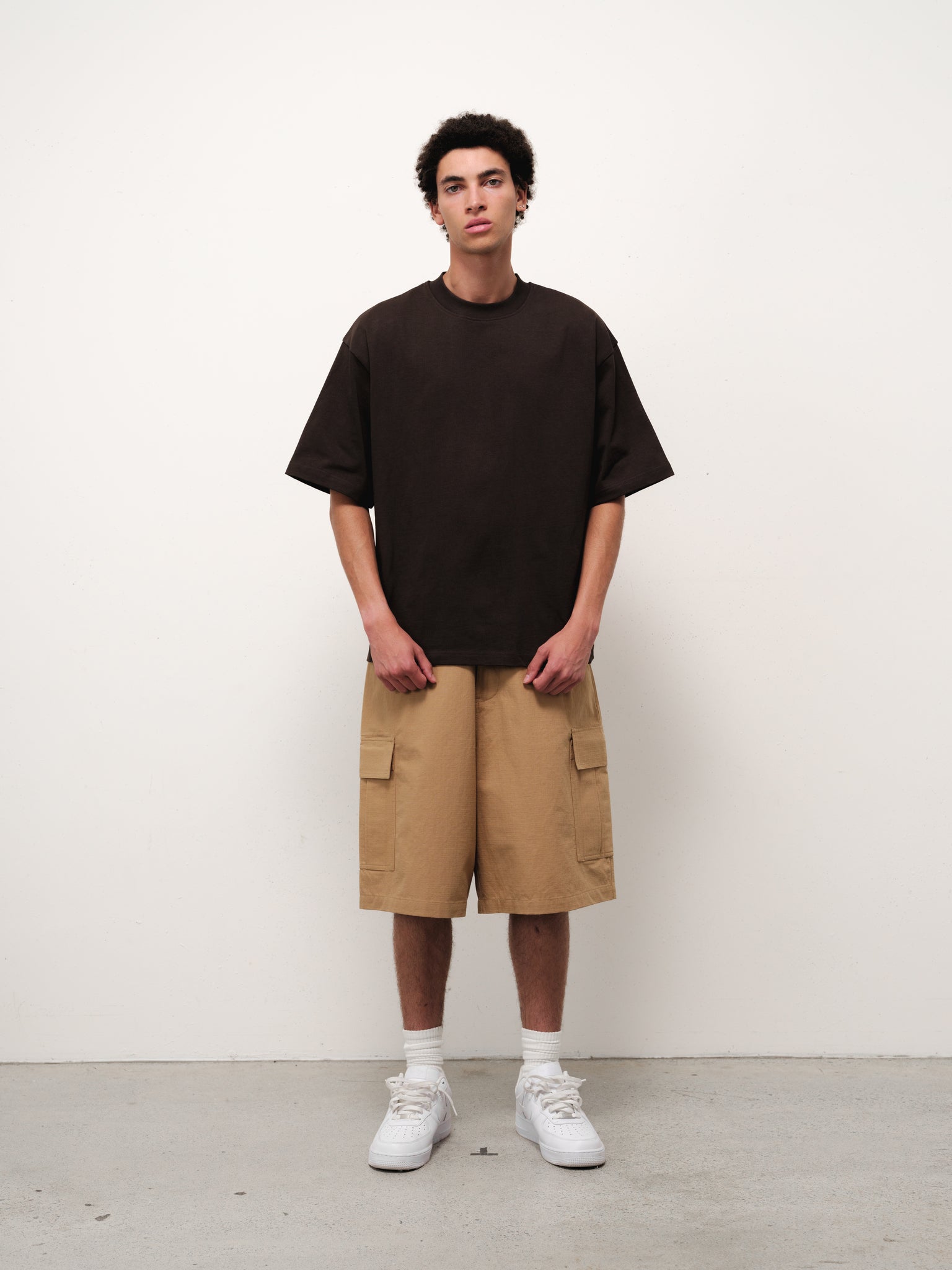 Sweats UK Signature Blank Coffee T-shirt displayed flat with front view, showcasing the classic casual design and soft fabric.