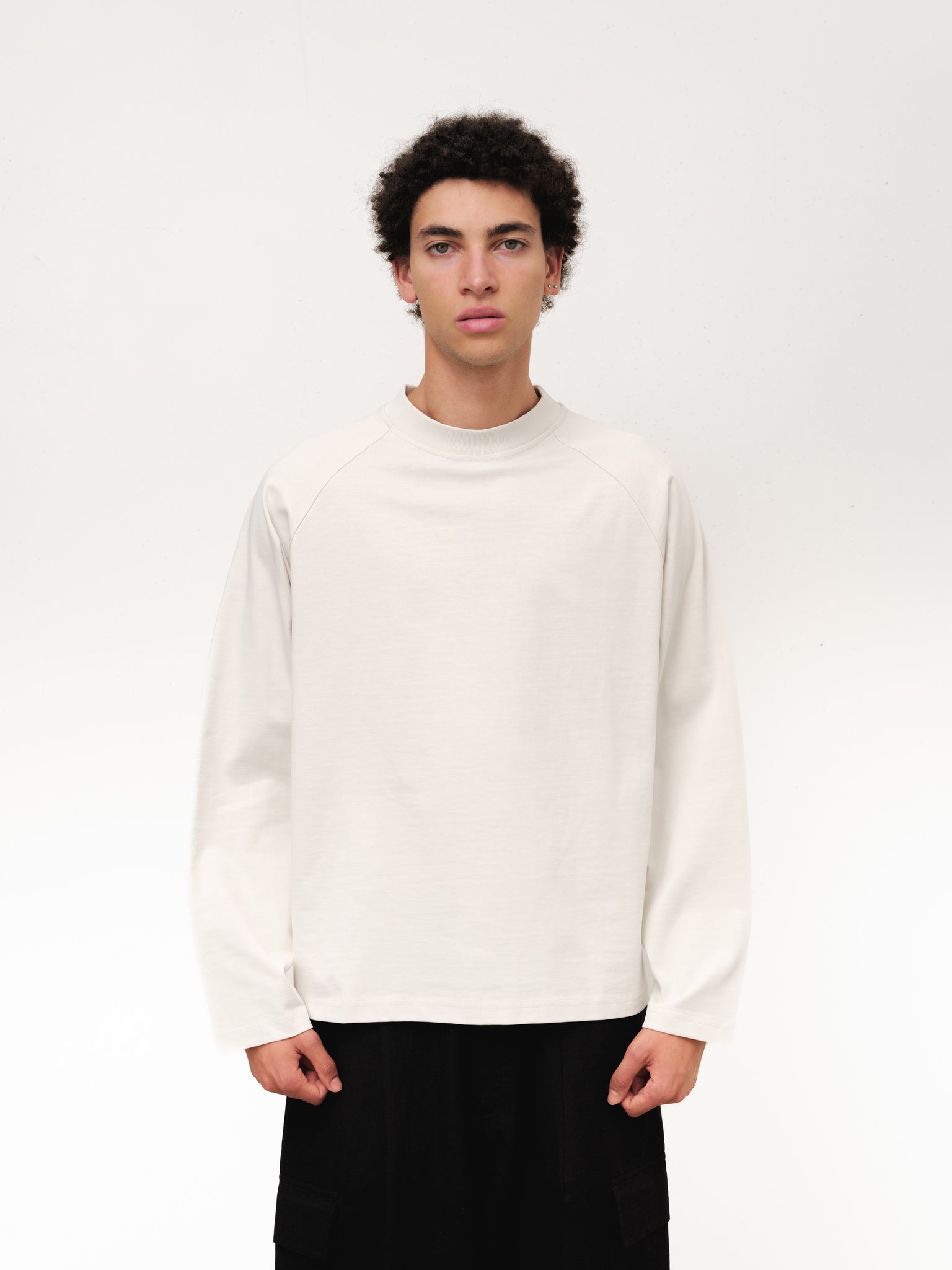 Long sleeve chalk T-shirt by Sweats UK, shown flat with visible neckline and sleeves, casual and comfortable style.