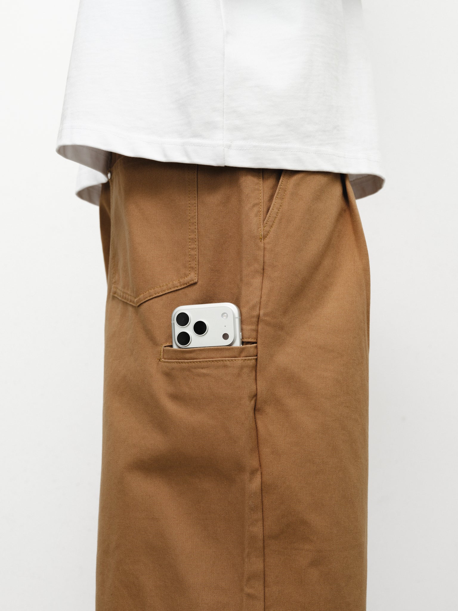 Tan workwear pants by Sweats UK, displayed in a full-stock shot showing durable fabric and functional design.