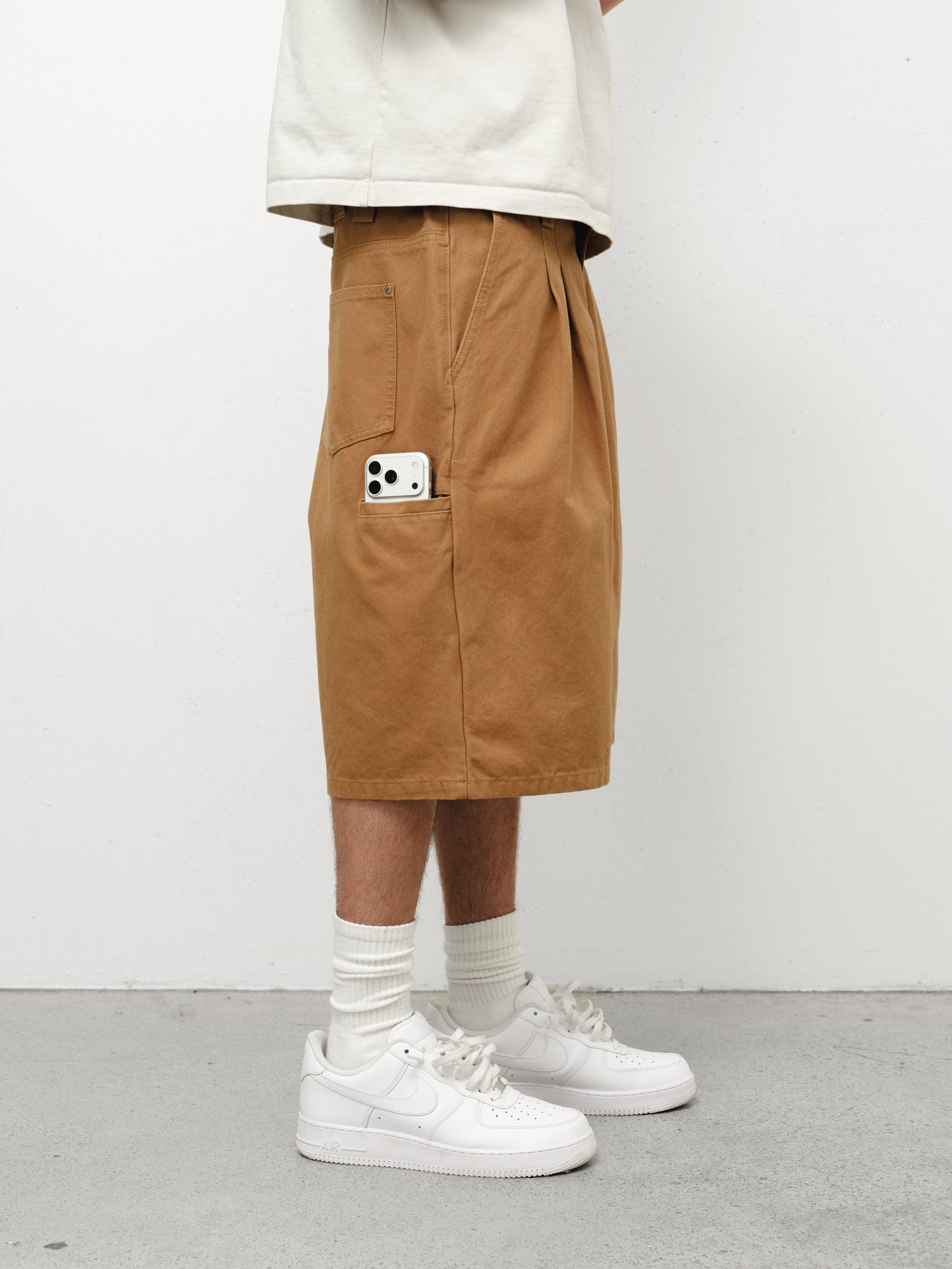 Tan workwear shorts by Sweats UK, featuring durable fabric and practical design for industrial or casual work environments.