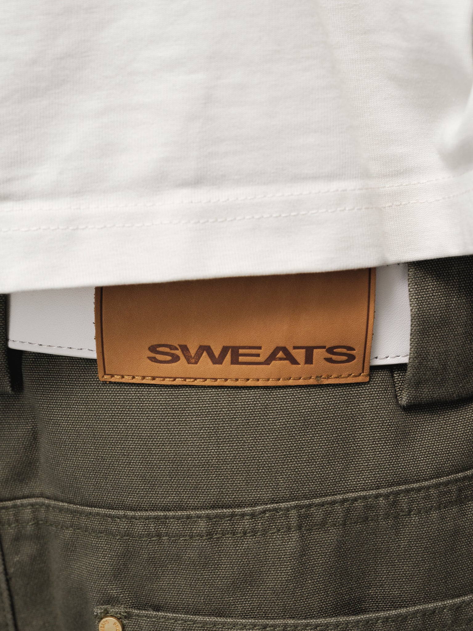 Olive workwear pants by Sweats UK, full-length view showing durable fabric and relaxed fit for industrial or outdoor use.