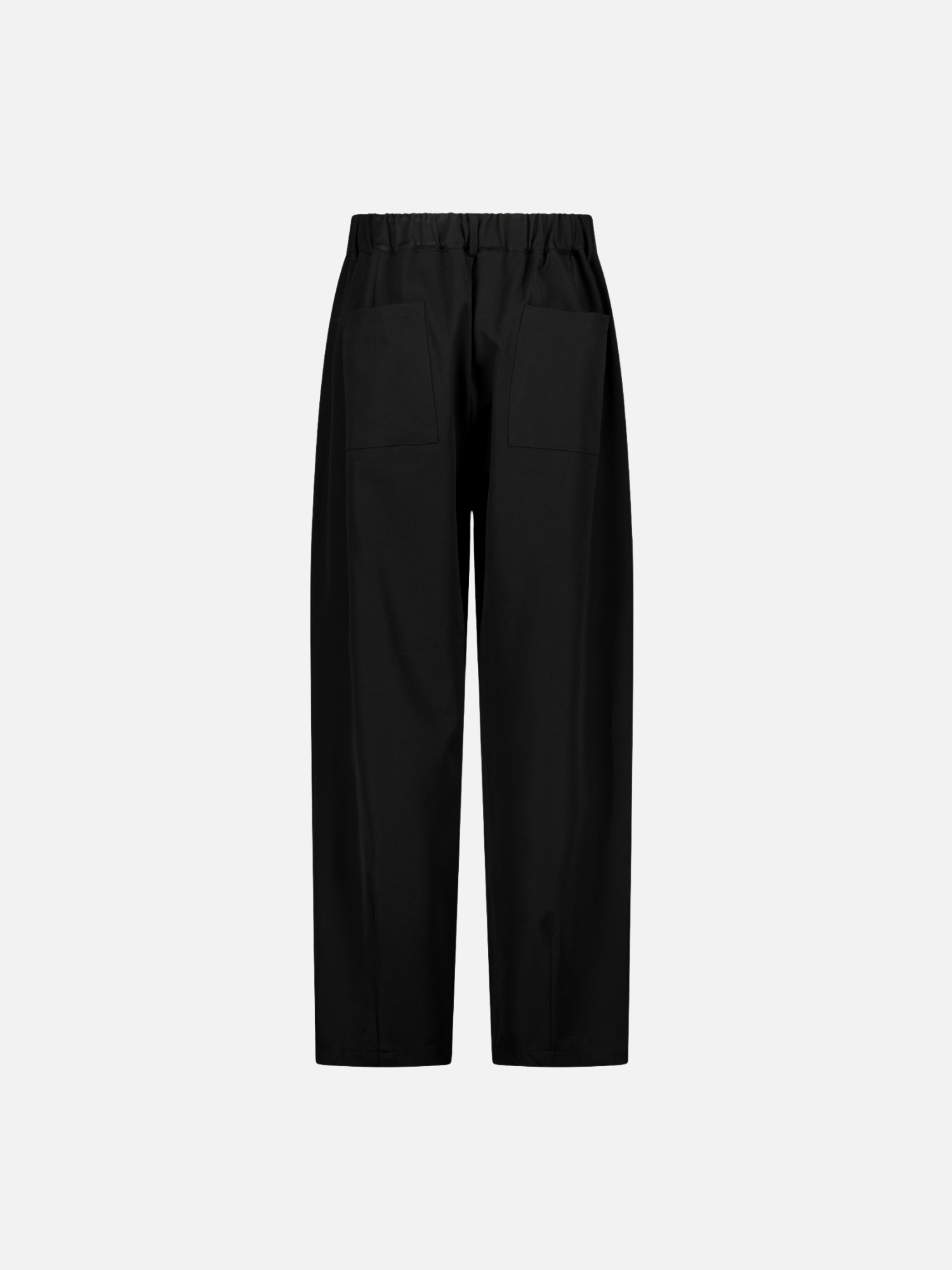 Back view of black pleated pants from Sweats UK, showcasing the stylish pleats and tailored fit for a modern look.