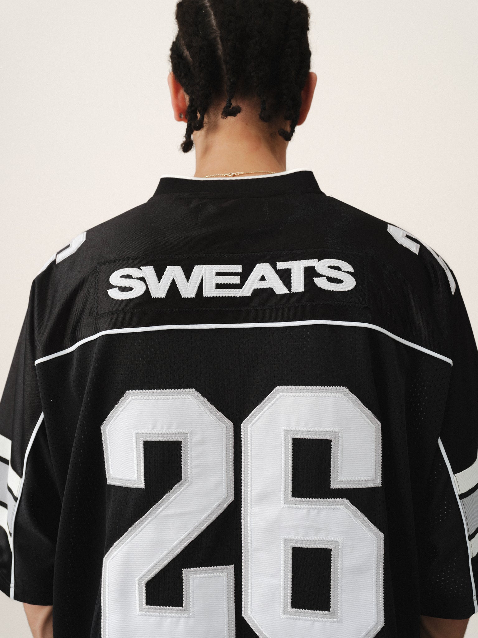 Black Signature Jersey by Sweats UK, showing a casual black jersey with minimal branding and a relaxed fit.