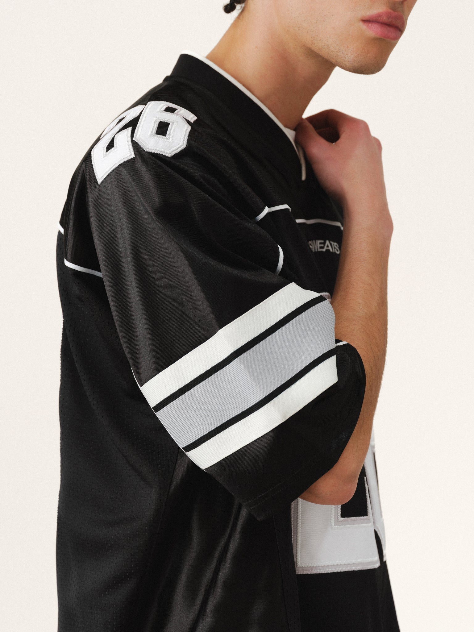 Black Signature Jersey by Sweats UK, featuring a comfortable fit and stylish design, displayed on a mannequin.