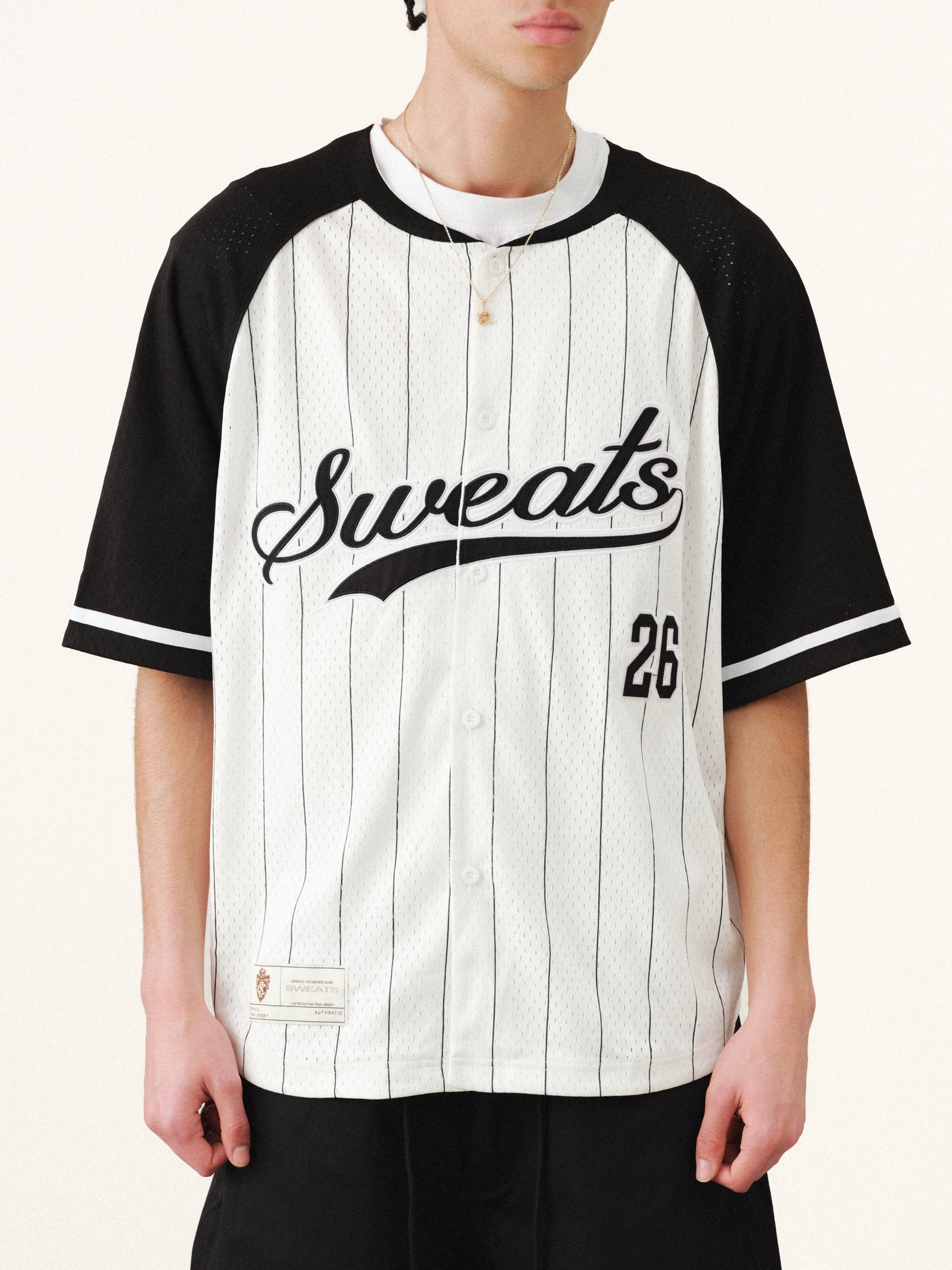 Sweats UK pinstripe baseball jersey with white and navy stripes, front buttons, and classic athletic fit.
