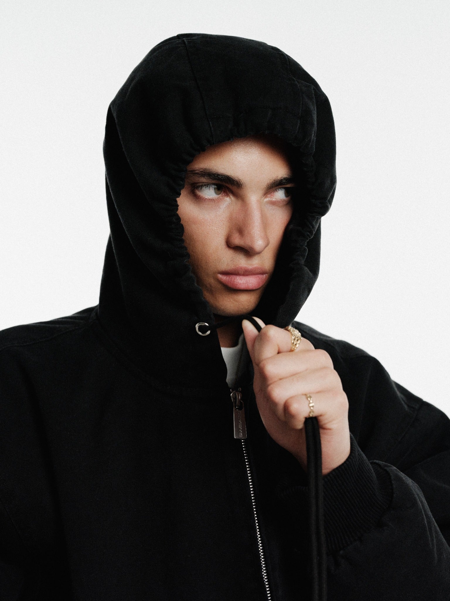 Washed black workwear hoodie from Sweats UK featuring a comfortable fit and durable fabric, ideal for work or casual wear.