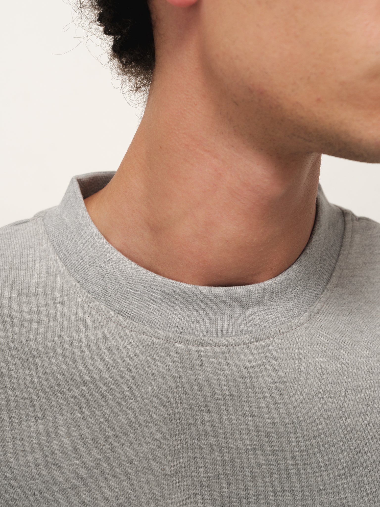 Marle grey Signature blank T-shirt by Sweats UK displayed on a model, showcasing casual fit and soft fabric.
