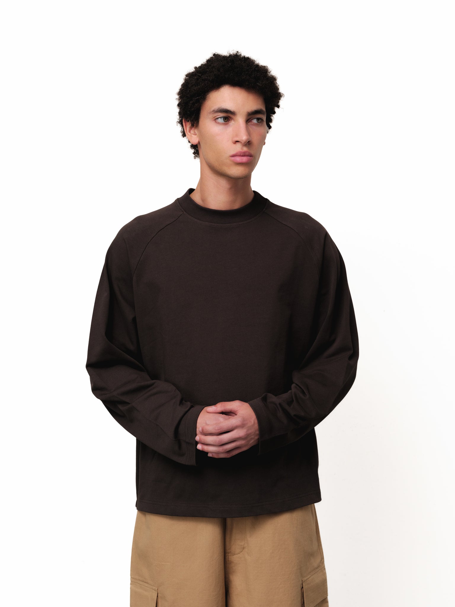 Long sleeve coffee-colored T-shirt from Sweats UK, shown flat with visible soft fabric and classic fit.