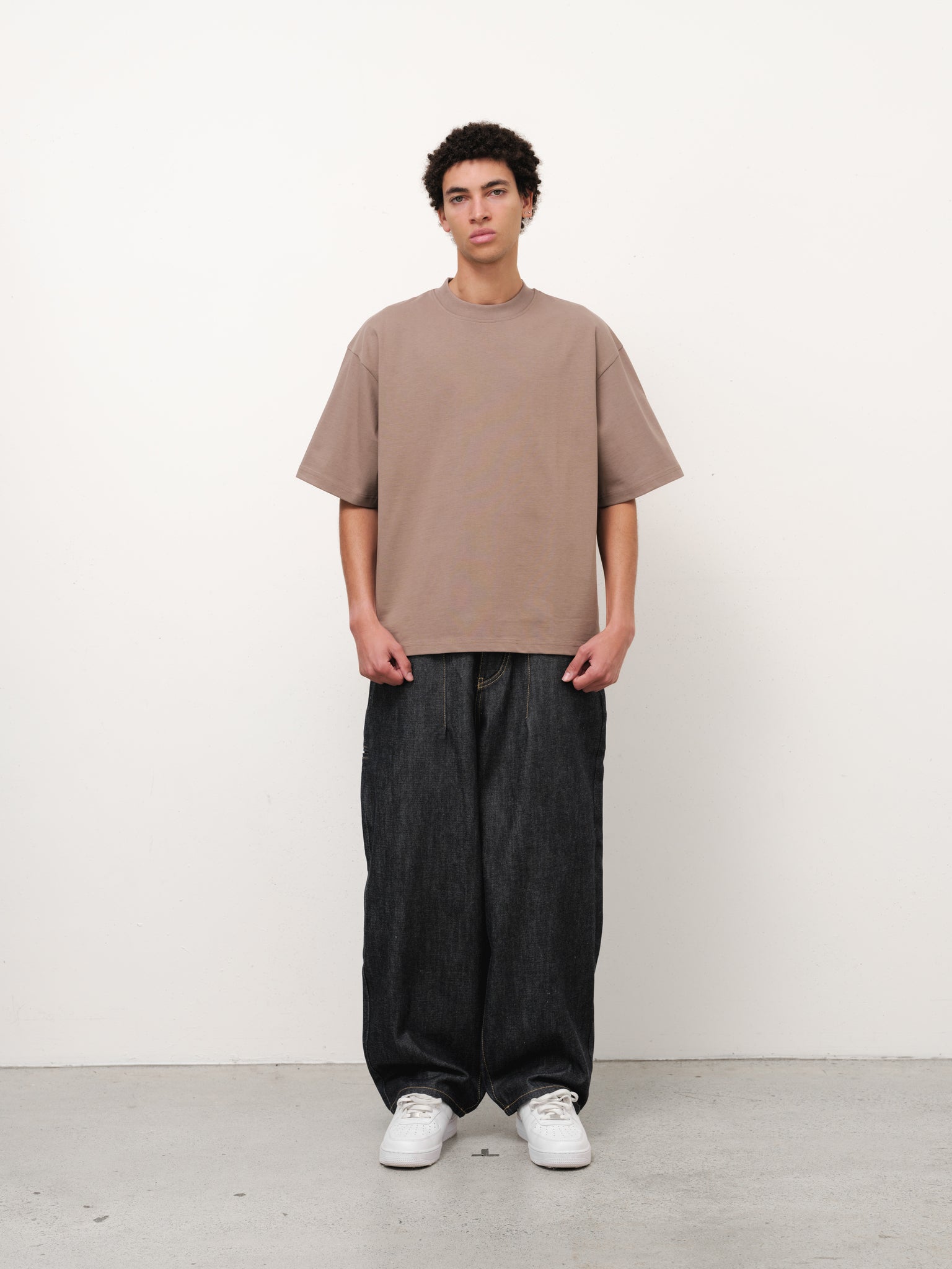Sweats UK Signature Blank T-Shirt in Dust color, full front view showcasing casual fit and soft fabric.