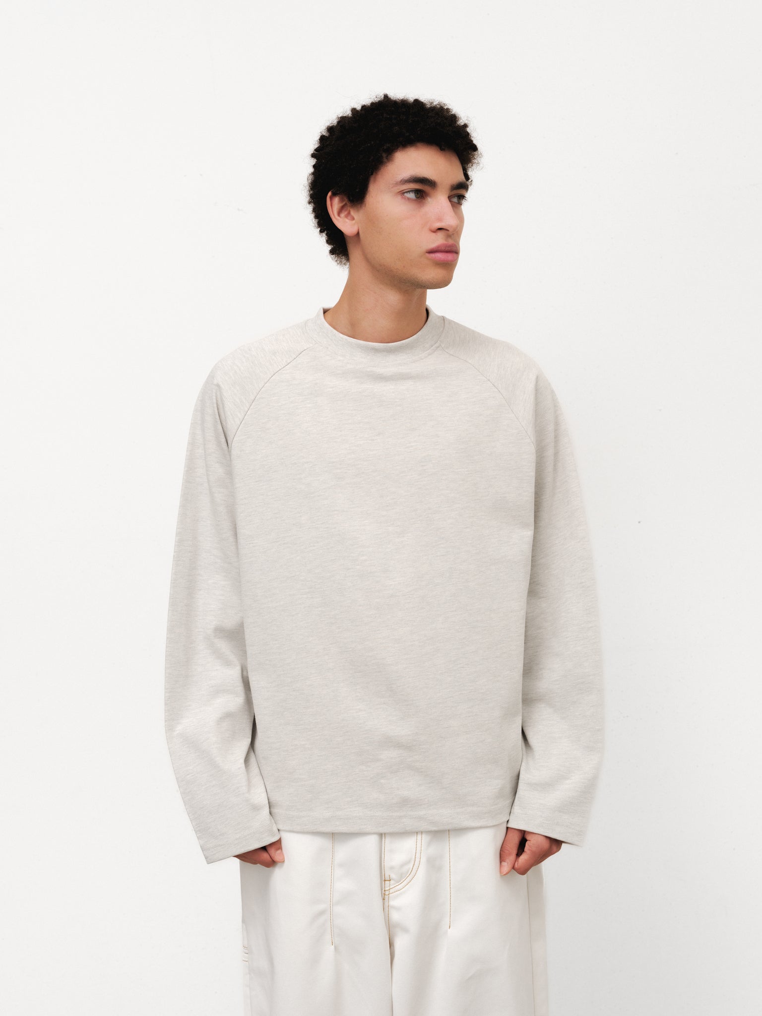 Long sleeve T-shirt from Arctyc by Sweats UK, featuring a comfortable fit and casual style in a full-length shot.