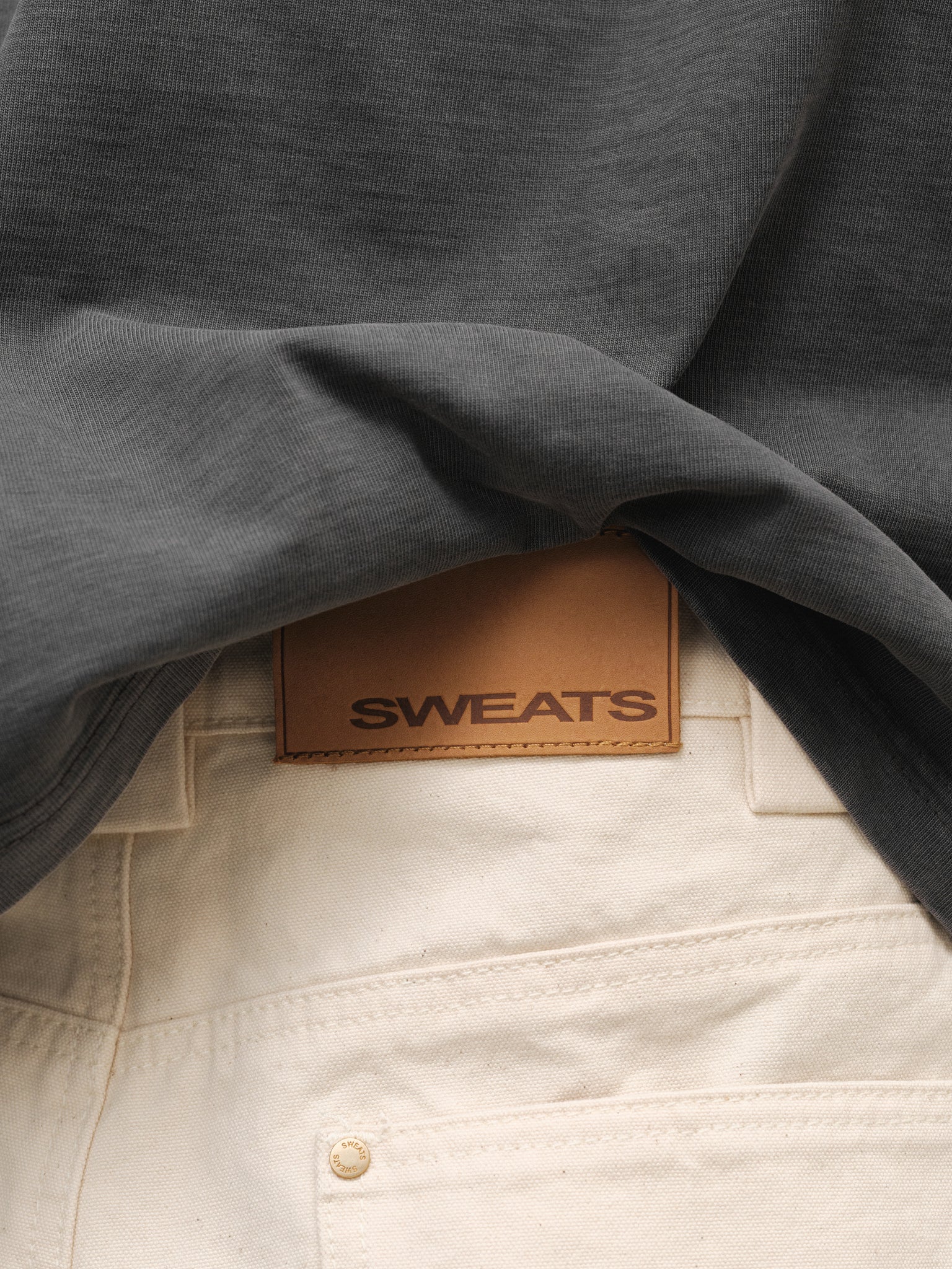 Ecru workwear pants by Sweats UK, full-length with durable fabric and classic fit, suitable for industrial or casual wear.