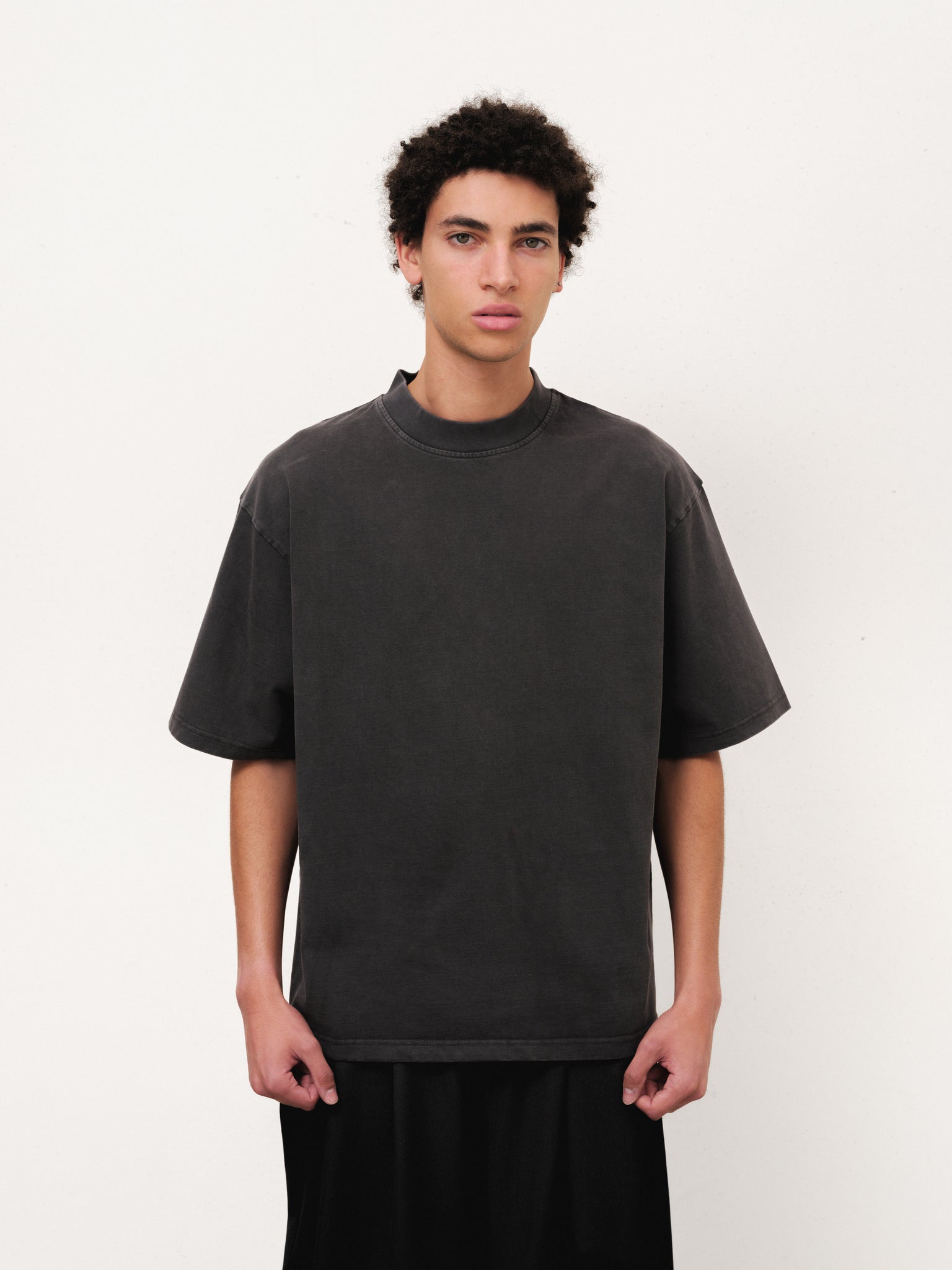 Sweats UK Signature Blank T-Shirt in washed black, front view showing soft cotton fabric and classic fit.