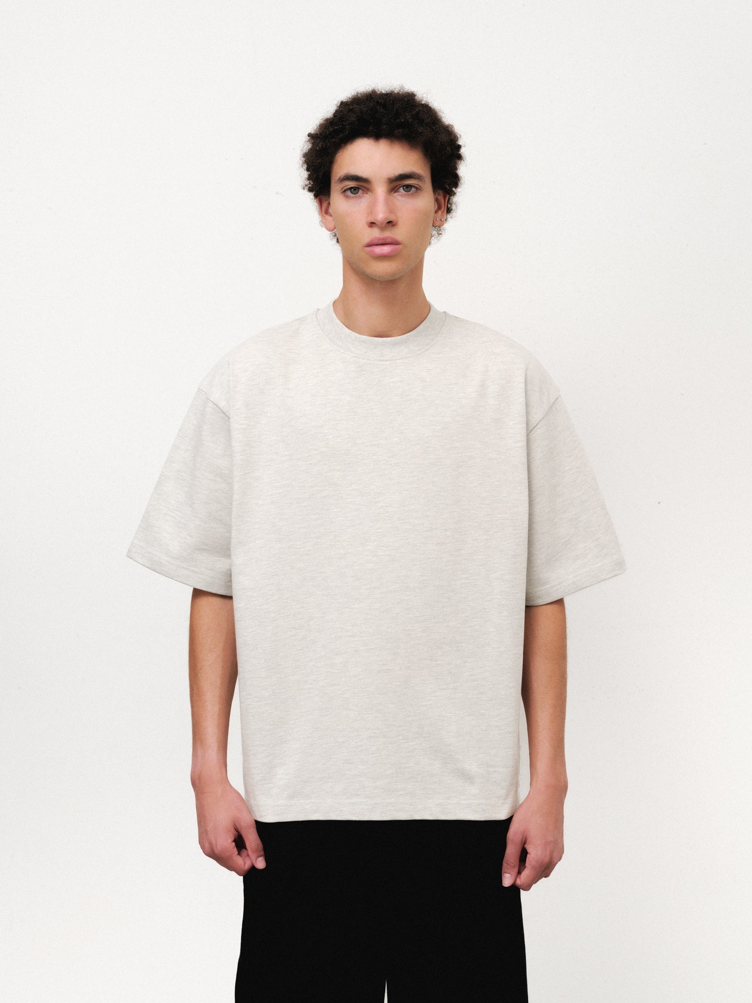 White Signature Blank T-shirt from Sweats UK, featuring a classic fit and soft cotton fabric, displayed flat on a plain background.