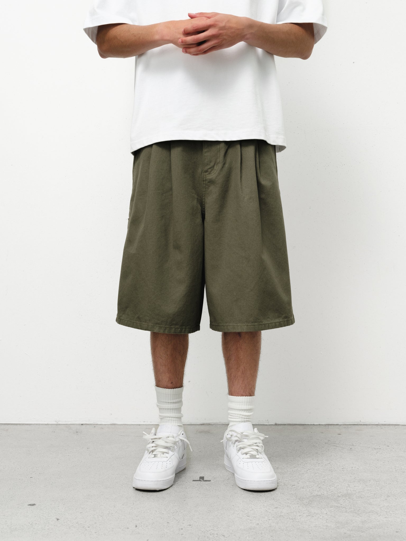 Olive workwear shorts by Sweats UK, featuring durable fabric and practical design for work or casual wear.