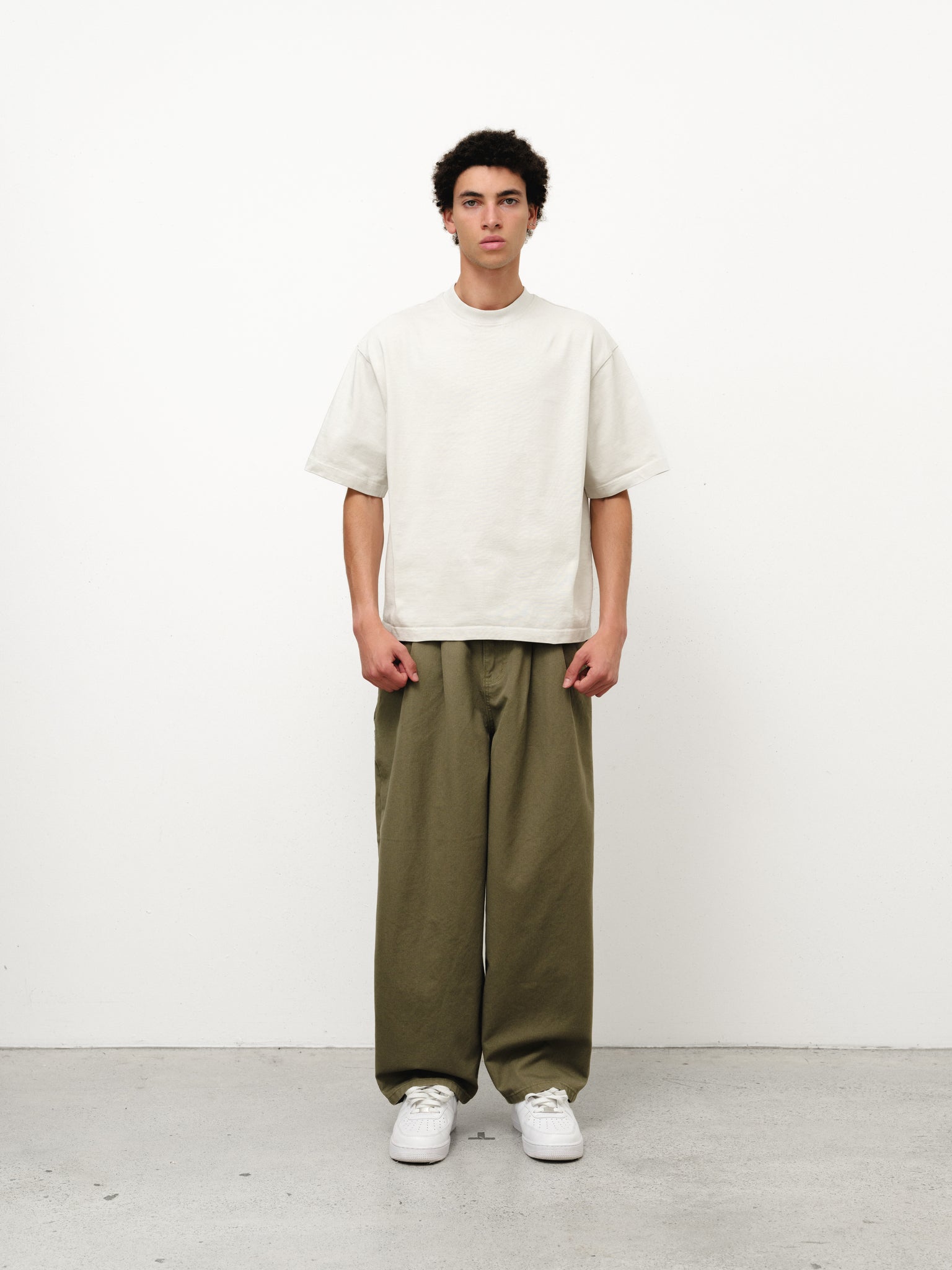 Olive workwear pants from Sweats UK, full-length view showing durable fabric and practical fit for industrial or casual use.
